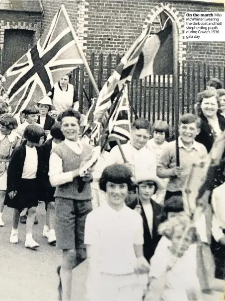  ??  ?? On the march Miss McWhirter (wearing the dark coat and hat) shepherdin­g pupils during Cowie’s 1936 gala day