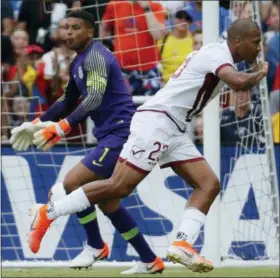  ?? JOHN MINCHILLO - THE ASSOCIATED PRESS ?? United States goalkeeper Zack Steffen (1) reacts after being scored on by Venezuela forward Jose Salomon Rondon (23) during the first half of an internatio­nal friendly soccer match, Sunday, June 9, 2019, in Cincinnati.