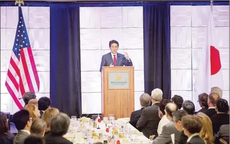  ??  ?? Japan’s Prime Minister Shinzo Abe speaks during a luncheon at the Japan-US Economy Forum in Los Angeles, California, on May 1. (AFP)
