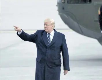  ?? SUSAN WALSH/THE ASSOCIATED PRESS ?? U.S. President Donald Trump gestures as he walks towards Air Force One at John F. Kennedy Internatio­nal Airport in New York, on Saturday.