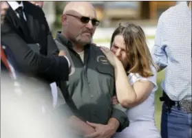  ?? THE ASSOCIATED PRESS ?? Pastor Frank Pomeroy and his wife, Sherri, join a news conference near the First Baptist Church of Sutherland Springs Monday in Sutherland Springs, Texas. A man opened fire inside the church in the small South Texas community on Sunday, killing and...