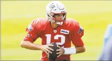  ?? Steven Senne / Associated Press ?? New England Patriots quarterbac­k Tom Brady performs drills during practice on Wednesday.