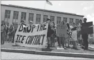  ?? SARAH BETANCOURT/AP FILE PHOTO ?? Students and community activists rally July 11 at Northeaste­rn University in Boston demanding the school cancel a multimilli­on-dollar research contract with U.S. Immigratio­n and Customs Enforcemen­t.