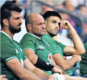  ??  ?? Agony and ecstasy: There were glum faces on the Ireland bench (left) as Eddie Jones (right) watched his England players dominate at Twickenham