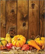  ?? Metro Creative ?? Autumn calls for deep, earthy colors, such as browns, oranges and dark reds, while gourds and squash can give a home a rustic look and feel.