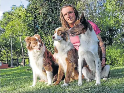  ?? Picture: SUPPLIED ?? CLEAN BEACH CAMPAIGN: Stefan Graunke, 26, and his three red border collies are taking on a massive eco mission, planning to clean up over 50 beaches along the South African coastline. The four will travel over 2,700km of coast, and they plan to be in East London, cleaning the city's beaches, in March.