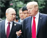  ?? JORGE SILVA / AFP / GETTY IMAGES FILES ?? Russian President Vladimir Putin and U.S. President Donald Trump at the APEC summit in Danang in 2017.