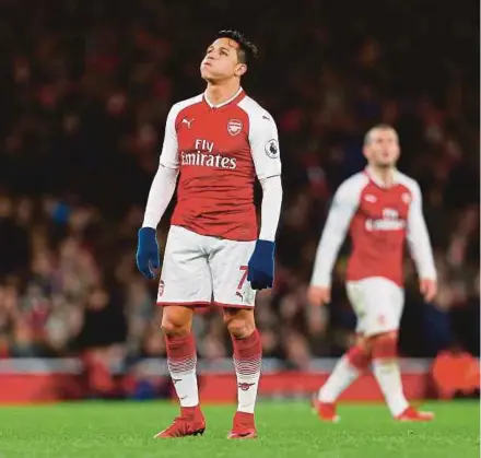  ??  ?? Arsene Wenger says want-away striker Alexis Sanchez could be sold to Manchester City. AFP PIC