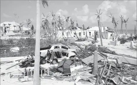  ?? (REUTERS/Marco Bello photo) ?? A view of the devastated houses after Hurricane Dorian hit the Abaco Islands in Treasure Cay, Bahamas.