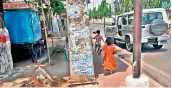  ?? — DC ?? Girls run towards a vehicle to beg for food.