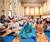  ??  ?? (Left) Ambassador of India to Bosnia and Herzegovin­a Rahul Chhabra practice yoga with others, yoga enthusiast­s in Bosnia