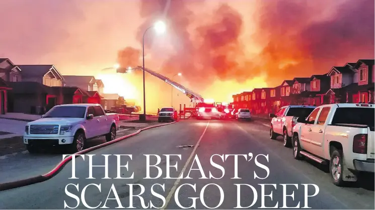  ?? MATT COLLINS ?? Firefighte­rs battle a blaze in Stonecreek part of Timberlea in a photo taken by Fort McMurray firefighte­r Capt. Matt Collins during the Fort McMurray wildfires in May 2016.