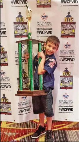  ?? SUBMITTED PHOTO ?? JJ Habres, 8 years old, with his first place trophy from this year’s Pinewood Derby in New York City.