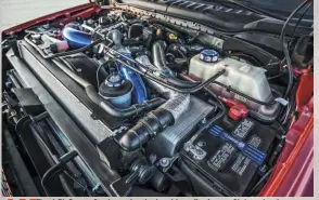  ??  ?? The 6.7L Power Stroke under the hood benefits from a Sinister Intake, Sinister Intercoole­r tube kit, Sinister Coolant filter and more.