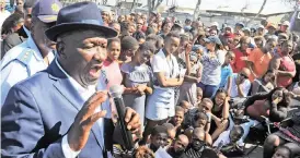  ?? News Agency (ANA) CINDY WAXA African ?? MINISTER of Police Bheki Cele visits Browns Farm in Philippi where five people were shot.
|