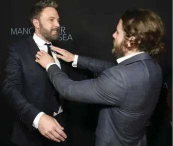  ?? CHRIS PIZZELLO/THE ASSOCIATED PRESS FILE PHOTO ?? Casey Affleck, right, is no longer in the shadow of his famous brother Ben, now that he’s Oscar nominated.