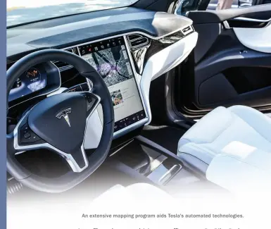  ??  ?? An extensive mapping program aids Tesla's automated technologi­es.