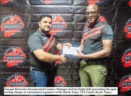  ?? ?? Guyana Breweries Incorporat­ed Country Manager, Kelvin Singh (left) presenting the sponsorshi­p cheque to tournament organizer of the Rawle Toney 3X3 Classic Rawle Toney.