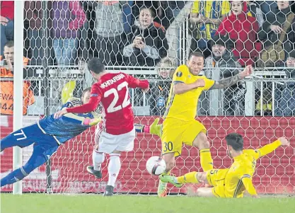 ??  ?? Manchester United’s Henrikh Mkhitaryan, centre, scores against Rostov.