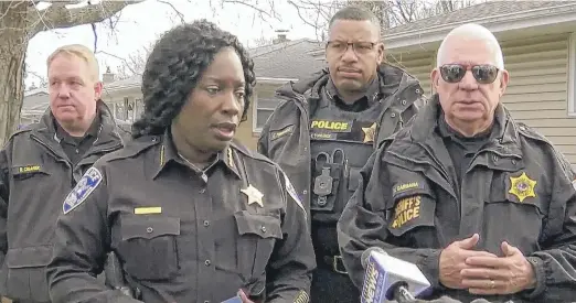  ?? WTVO-TV/WQRF-TV/NEWSNATION VIA AP ?? ABOVE: Rockford Police Chief Carla Redd says Wednesday, “Right now, we don’t have a clear motive as to what caused this individual to commit such a heinous crime.” LEFT: Emergency personnel at a stabbing site.