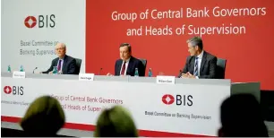  ?? Reuters ?? Basel Committee on Banking Supervisio­n chair Stefan Ingves, European Central Bank President Mario Draghi and committee general secretary William Coen at a news conference in Frankfurt. —