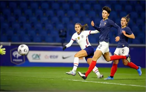  ?? AP Photo/David Vincent ?? United States’ Alex Morgan (13) scores a goal against France during an internatio­nal friendly women’s soccer match between the United States and France in Le Havre, France, on Tuesday.