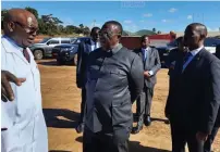  ?? ?? Vice President Chiwenga is briefed by Engineer Marawa (left) while Minister Mhona looks on yesterday.