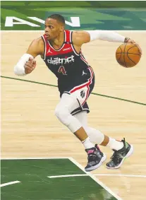  ?? STACY REVERE/GETTY IMAGES ?? Russell Westbrook of the Washington Wizards just passed Oscar Robertson's career triple-double record Monday.