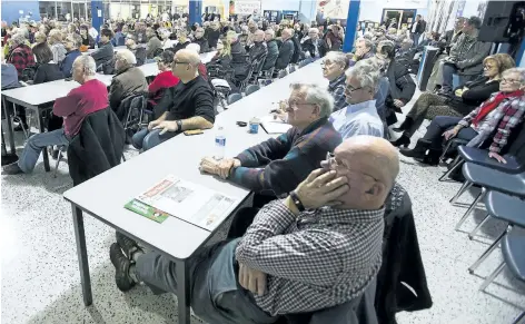  ?? JULIE JOCSAK/ STANDARD STAFF ?? People pack the cafeteria of E. L. Crossley Secondary School in Fonthill Wednesday night to listen to KPMG present the results of its audit of Town of Pelham finances.