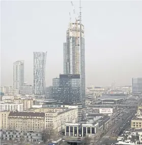  ?? REUTERS ?? The Varso Tower is seen under constructi­on in central Warsaw on Tuesday.