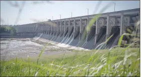  ?? The New York Times/SEPTEMBER DAWN BOTTOMS ?? The Pensacola Dam near Miami, Okla., built in 1940, keeps Grand Lake levels high to the anger of Miami residents who contend that U.S. Sen. James Inhofe is putting his interests and others’ in the wealthy lake community above the need for proper flood control.