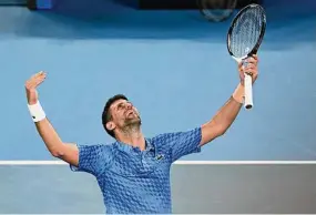  ?? Quinn Rooney/Getty Images ?? Novak Djokovic celebrates winning championsh­ip point in the men’s singles final against Stefanos Tsitsipas at the Australian Open on Sunday in Melbourne, Australia.