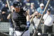  ?? LYNNE SLADKY — THE ASSOCIATED PRESS ?? Giancarlo Stanton hits in the batting cage at Yankees’ spring training camp.