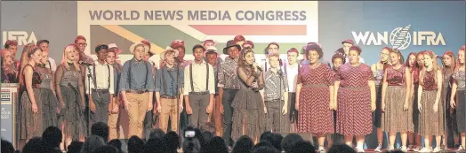  ?? PICTURE LEON LESTRADE ?? VOICES: The KwaZulu-Natal Youth Choir, which has its sights set on winning the Golden Voices Festival in Spain next month, performs at the recent World News Media Congress at Durban’s ICC.