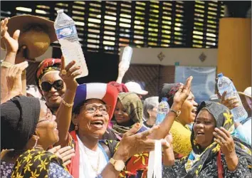  ?? Gregoire Merot Associated Press ?? DEMONSTRAT­ORS gather in September to protest the water crisis in Mamoudzou, on the French Indian Ocean territory of Mayotte. Residents say the coming rainy season won’t be enough to fix the problems.