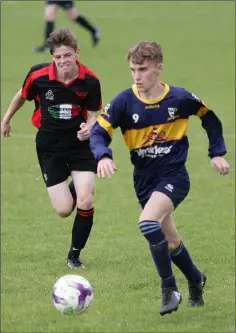  ??  ?? Kevin White of Duncannon F.C. is tracked by Tom Scallan of Bridge Rovers during Saturday’s Youth Division 1 match.