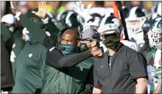  ?? CARLOS OSORIO — THE ASSOCIATED PRESS ?? Michigan State head coach Mel Tucker pumps his fist after the team defeated Michigan in an Oct. 31 game in Ann Arbor.