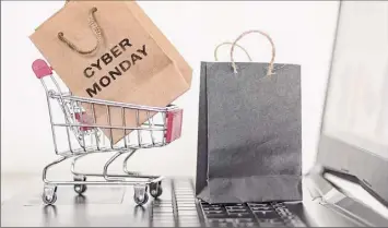  ?? R Franca / Eyeem / Getty Images / Eyeem ?? Cyber Monday sales are expected to top $12.7 billion in 2020, according to Adobe Analytics, an increase of about $3 billion over 2019.