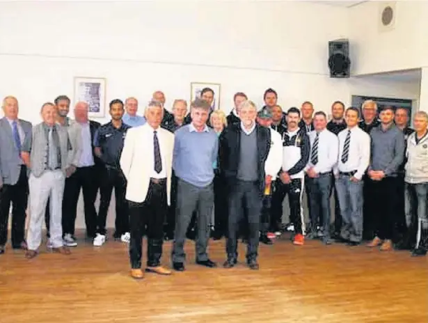  ??  ?? Lancashire League players and officials at the funding announceme­nt made at Todmorden Cricket Club