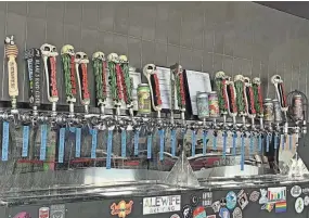 ?? ?? There are plenty of taps at the new Burn 'Em in Michigan City.