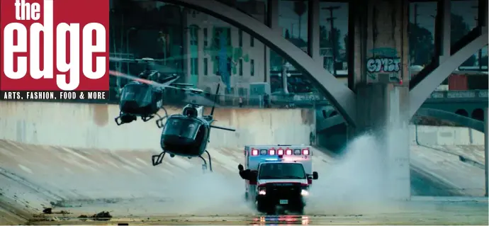  ?? UNIVERSAL PICTURES ?? FLYING LOW: Police helicopter­s track the hijacked ambulance as it’s driven down the Los Angeles River.