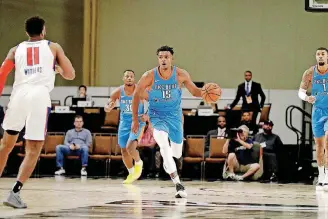  ?? [COURTESY NBA PHOTOS] ?? Donte Grantham of the Oklahoma City Blue dribbles the ball against the Grand Rapids Drive during the NBA G League Winter Showcase in Las Vegas on Dec. 21.