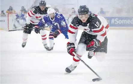  ?? MARK BLINCH/ THE CANADIAN PRESS ?? Since TSN acquired the world junior broadcast rights in 1991, the tournament has gone from attracting “friends and family” to millions of viewers on TV. An average of 2.7 million viewers watched the Canada-U.S. outdoor game in Buffalo last week.