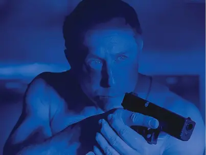  ?? COURTESY OF MATT PAGE ?? Matt Page stars in his directoria­l debut, “Cop Vs Festival.
Killer,” which premieres at the Santa Fe Film