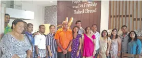  ?? Photo: Charles Chambers ?? Staff members join the Meghji family & the chief guest Joe Rodan of Paradise Beverages and his team during the opening of new Fresh Choice Supermarke­t in Lautoka on March 27, 2021.