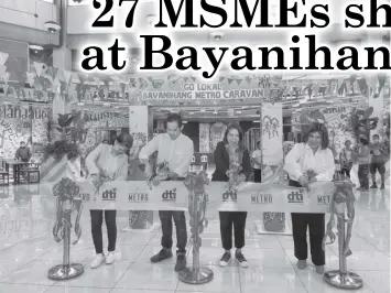  ?? ?? (L-R) DTI-7 assistant regional director Esperanza Hope Melgar, MRSGI vice president Marco Eric Gaisano Ang, DTI-7 regional director Maria Elena Arbon and MRSGI regional manager, store operations Glenda Navares during the opening of the Bayanihang Metro Caravan.