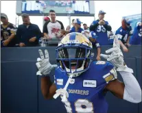  ?? CANADIAN PRESS PHOTO ?? Winnipeg Blue Bombers wide receiver Rasheed Bailey celebrates teammates Kenny Lawler’s, not shown, touchdown against the Hamilton Tiger-Cats during first half CFL action in Winnipeg Thursday