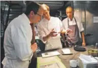  ??  ?? Chef Dan Barber, center, prepares a dish for WastED, a 2015 New York event to shed light on food waste. The dishes used scraps and other ignored bits.