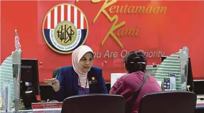  ?? [FOTO HIASAN] ?? KWSP memperuntu­kkan tambahan dana RM50 bilion bagi Simpanan Syariah 2018 kepada pencarum yang mahu bertukar kepada skim berkenaan.