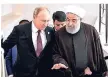  ?? FOTO: KREMLIN/DPA ?? Neue Freunde? Wladimir Putin (l.) und Hassan Ruhani.